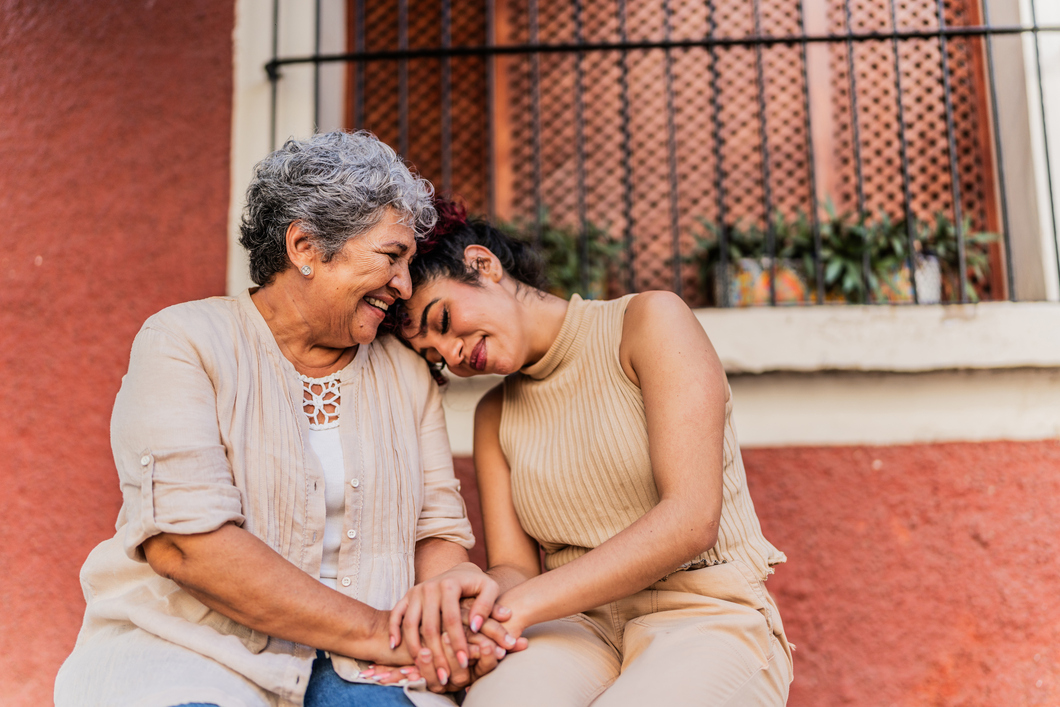 Grandmother and granddaughter outdoors